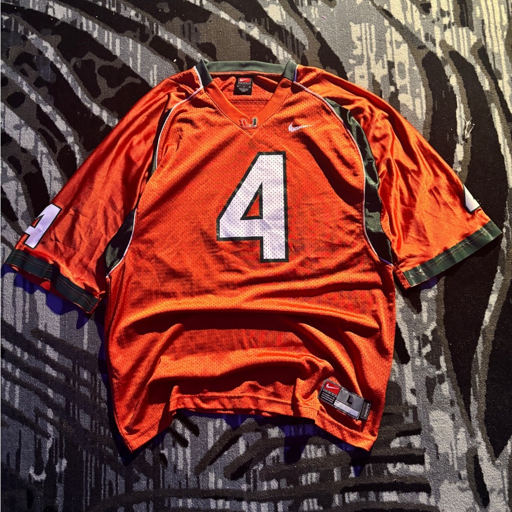 Nike Men’s Orange Football Jersey with White Number 4 and Green Accents